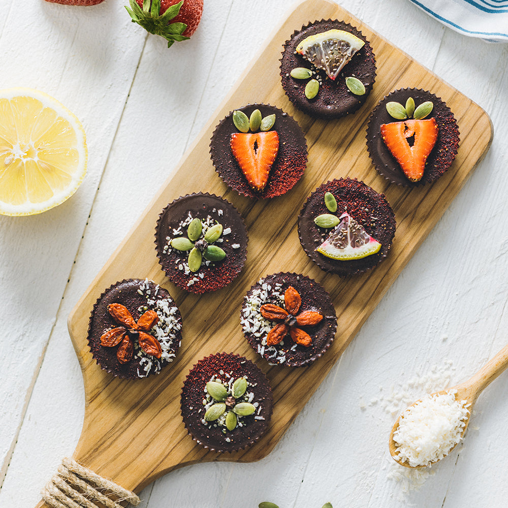Sunflower Butter Cups with Bright Toppings: goji berries, pepitas, lemon slices, strawberries, coconut and more!