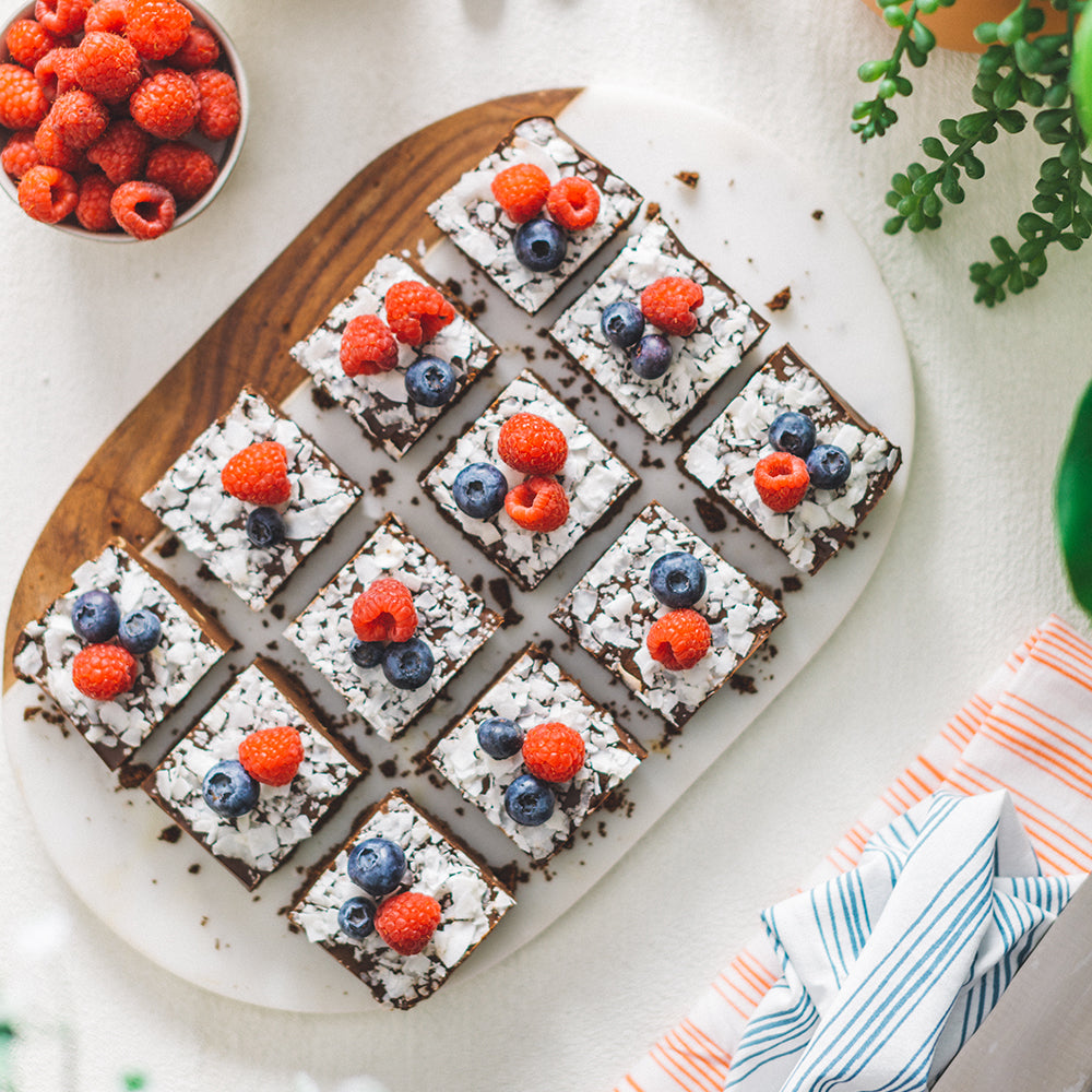 Chocolate SunButter Bars With Fresh Raspberries, Blueberries and Shaved Coconut