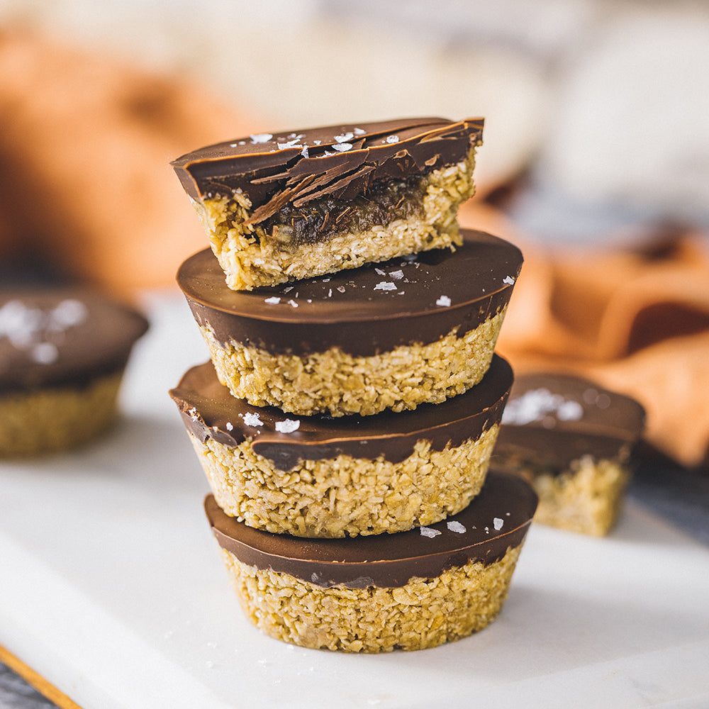 Salted Dark Chocolate and Date Caramel Oat Cups topped with Sea Salt