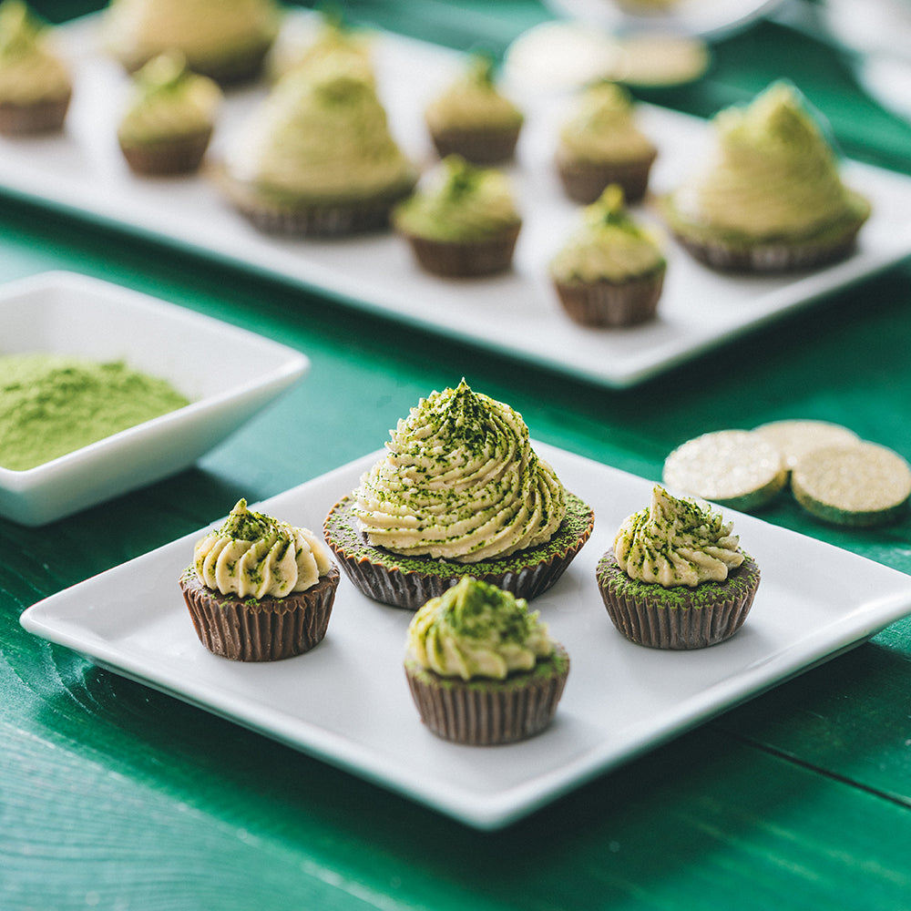 Sunflower Butter Cups Topped with Frosting and Dusted with Matcha Powder