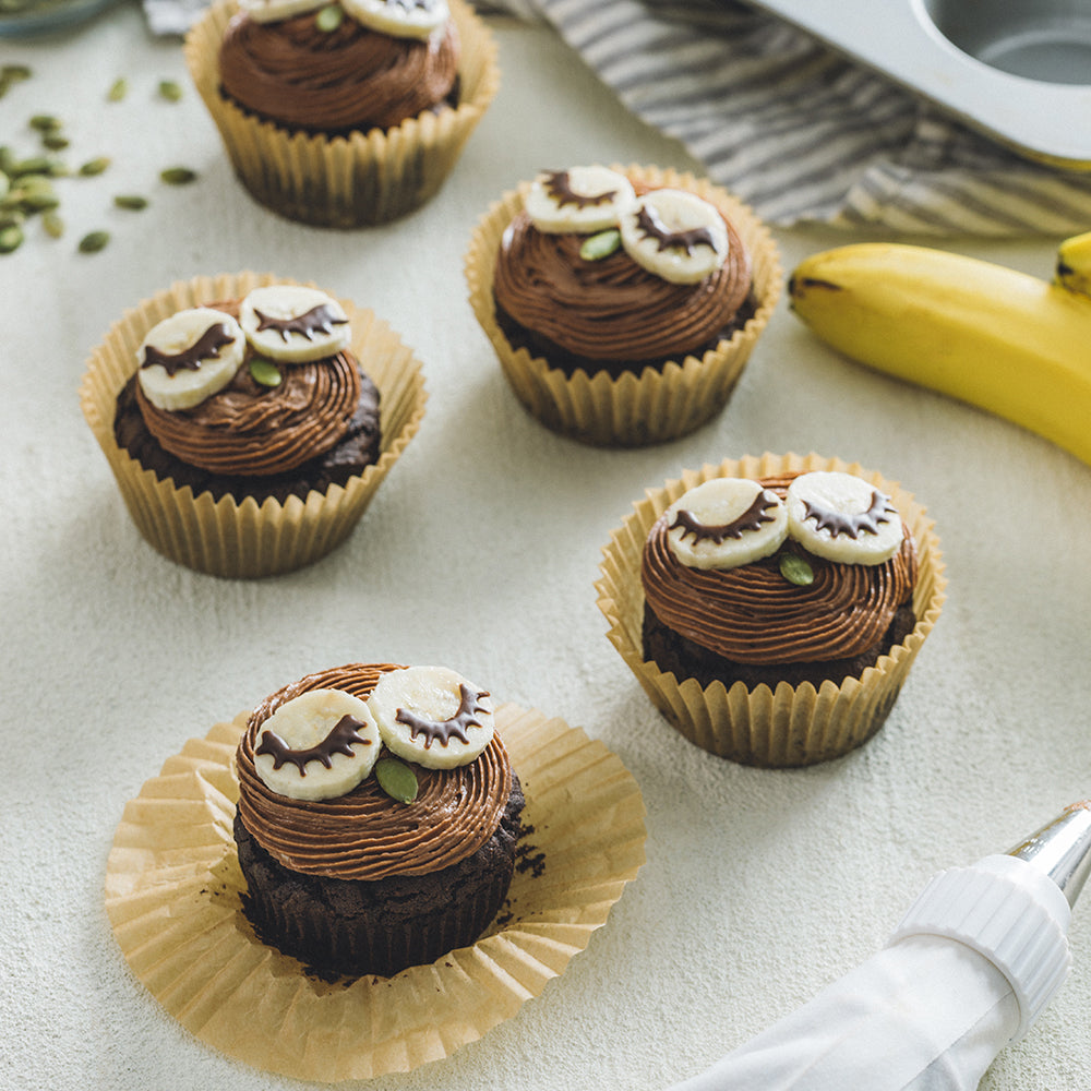 Dark Chocolate Cupcakes Decorated to Look Like Owls