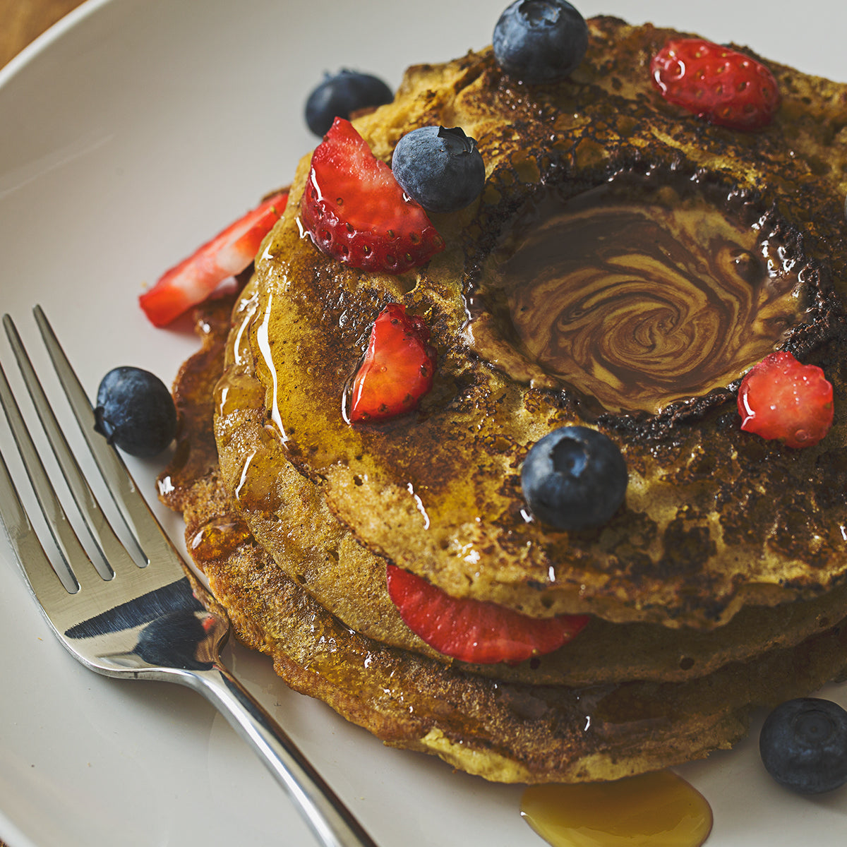 Sun Cups Volcano Pancakes Topped with Blueberries and Strawberries